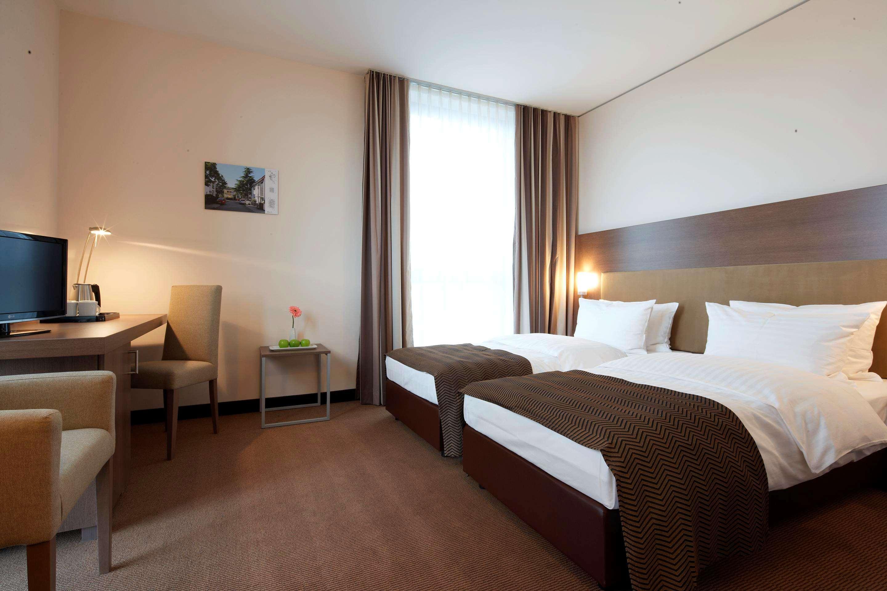 Intercityhotel MHG Pokoj fotografie