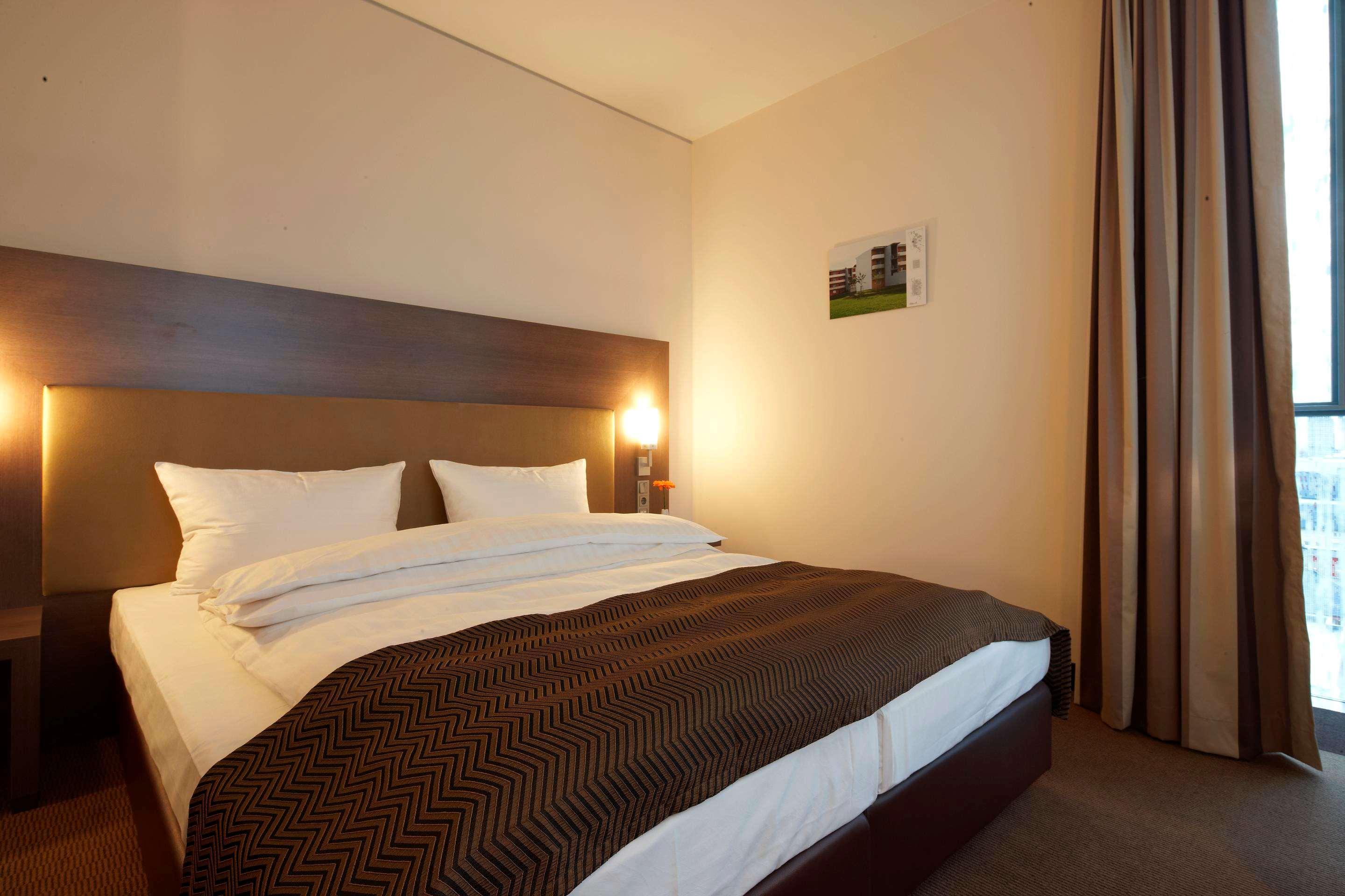 Intercityhotel MHG Pokoj fotografie